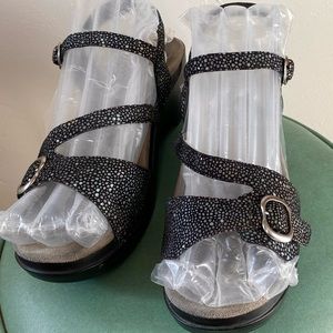 Size 10 vintage Dansko sandals. Dance all night and still be able to walk.